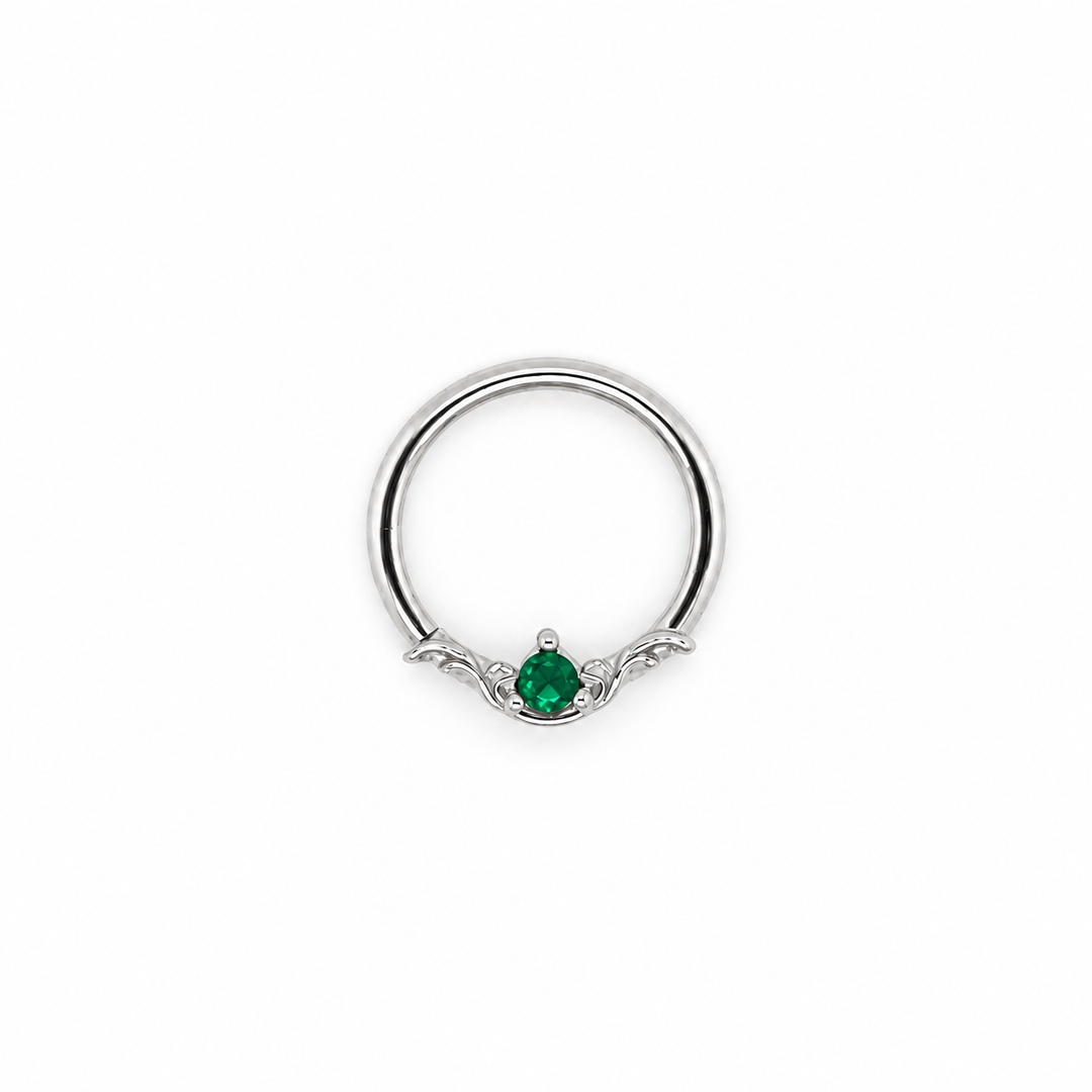AuAdore Bishop Lab Emerald ring in 14k white gold with a green round gemstone and matching white-gold prongs and filigree on white.