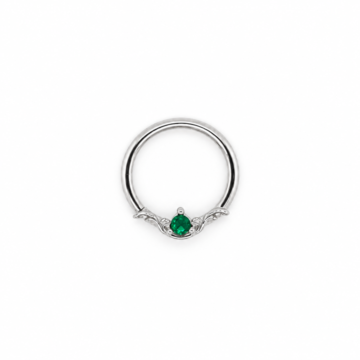 AuAdore Bishop Lab Emerald ring in 14k white gold with a green round gemstone and matching white-gold prongs and filigree on white.