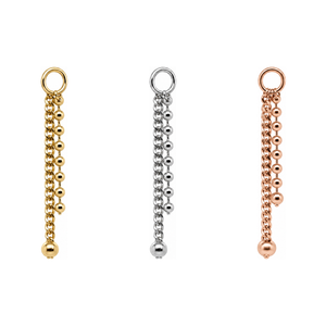 AuAdore Devotion Double Drop shown in 14k yellow gold, white gold, and rose gold on a white background.