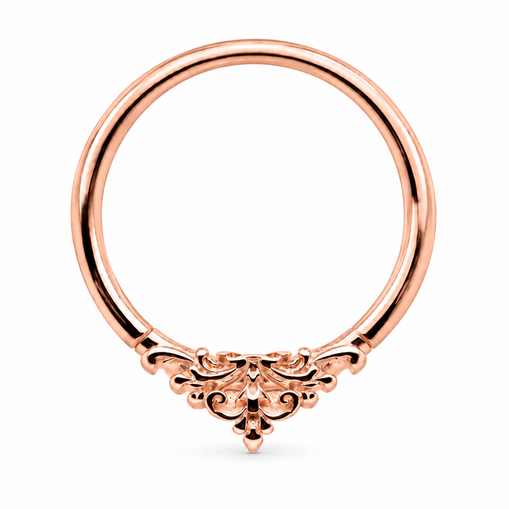 AuAdore Florentine ring in 14k rose gold, with a smooth hoop top and matching rose-gold filigree, centered on white.