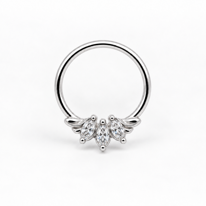 AuAdore Grandeur CZ 16g piercing ring in 14k white gold, with three clear marquise gemstones and matching white-gold prongs and filigree on white. Digital product illustration.