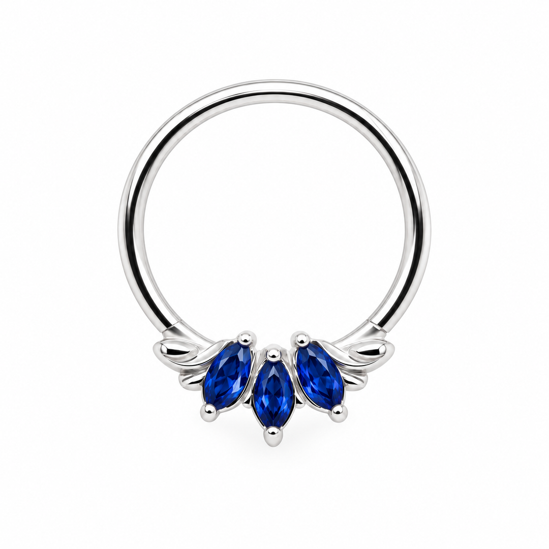 AuAdore Grandeur Lab Blue Sapphire ring in 14k white gold, with three blue marquise gemstones, matching white-gold prongs and delicate side flourishes on white.