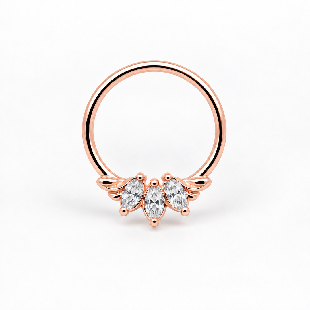 AuAdore Grandeur Lab Diamond ring in 14k rose gold, with three clear marquise gemstones, matching rose-gold prongs and a smooth hoop top on white.