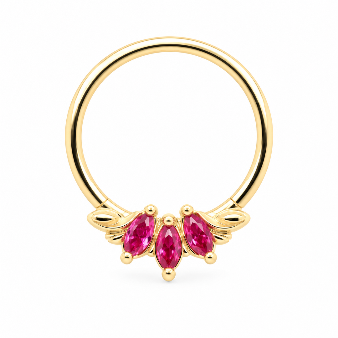AuAdore Grandeur Lab Pink Sapphire ring in 14k yellow gold, with three pink marquise gemstones, delicate side flourishes and a smooth hoop top on white.