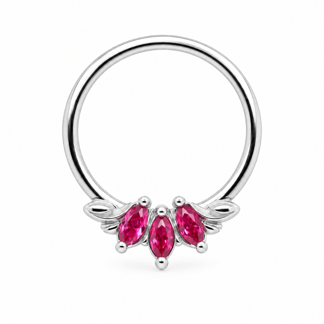 AuAdore Grandeur Lab Pink Sapphire ring in 14k white gold, with three pink marquise gemstones, matching white-gold prongs and side flourishes and a smooth hoop top on white.