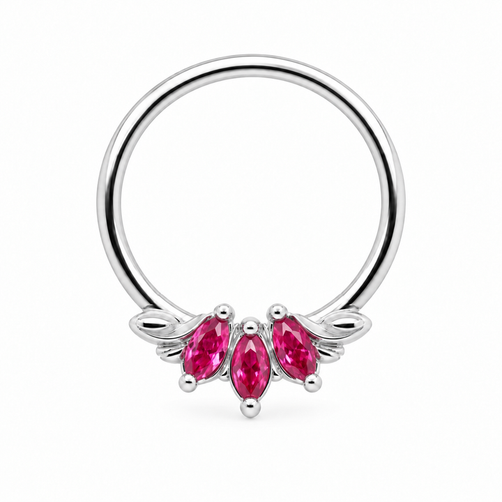 AuAdore Grandeur Lab Pink Sapphire ring in 14k white gold, with three pink marquise gemstones, matching white-gold prongs and side flourishes and a smooth hoop top on white.