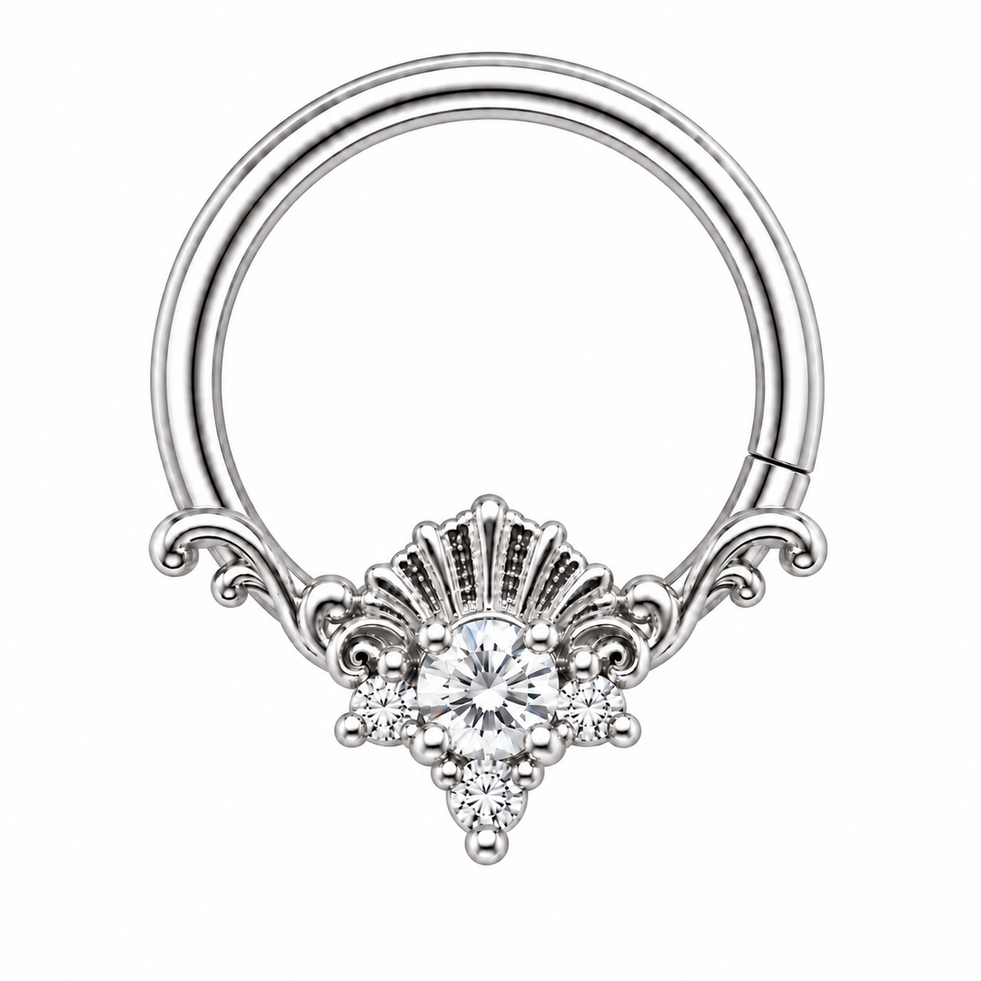 AuAdore Lennox CZ 16g seam ring in white gold, with a brilliant clear round center stone, three smaller clear stones and matching white-gold prongs, textured shell crest and filigree. One lower-right seam. Digital product illustration.