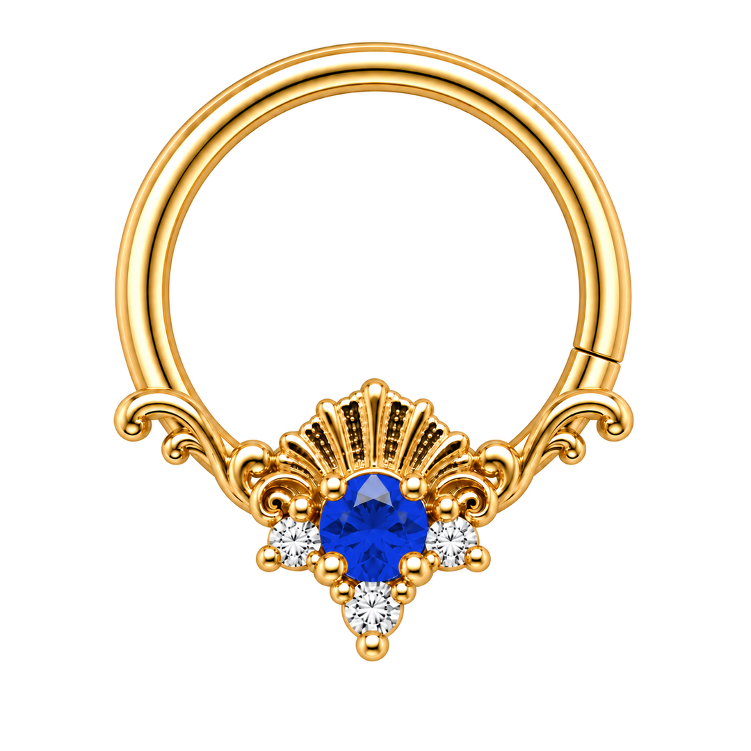 AuAdore Lennox Lab Blue Sapphire and Diamond 16g ring in yellow gold, with a blue round center and three clear accents, corrected textured shell crest and one lower-right seam. Digital color illustration.