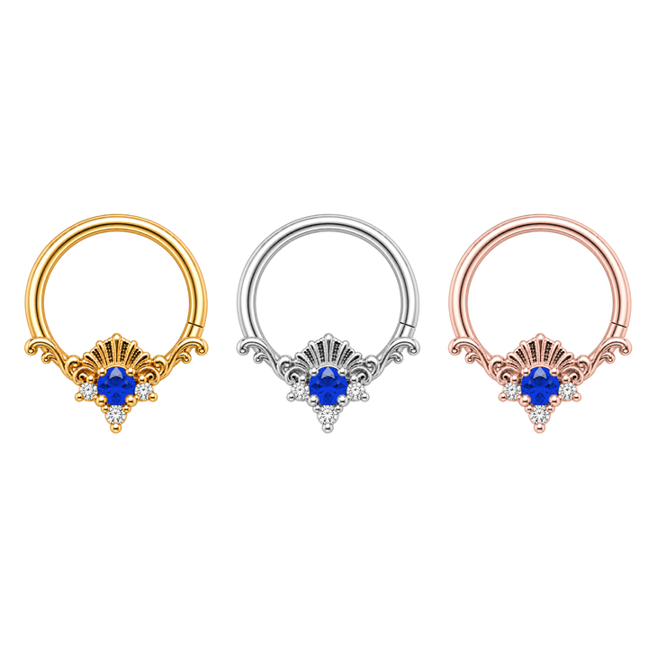 Three AuAdore Lennox Lab Blue Sapphire and Diamond rings in one horizontal row: yellow gold, white gold, rose gold. Matching blue centers, clear accents and one lower-right seam on each. Digital color illustration.