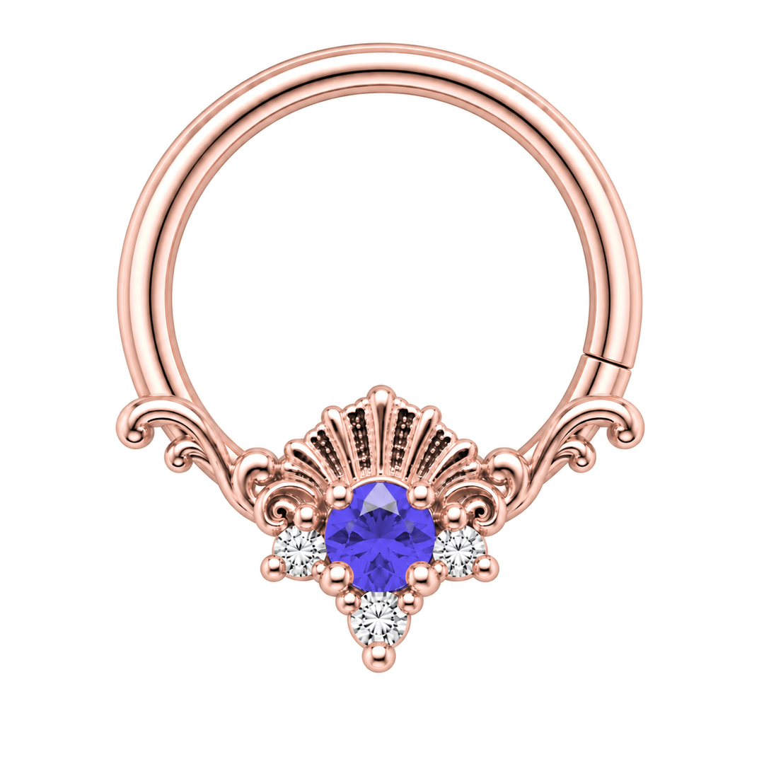 AuAdore Lennox Tanzanite and Lab Diamond 16g ring in rose gold, including matching rose-gold prongs and filigree. Blue-violet center, three clear accents and one lower-right seam. Digital color illustration.